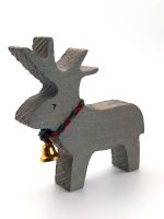 Little reindeer with clock